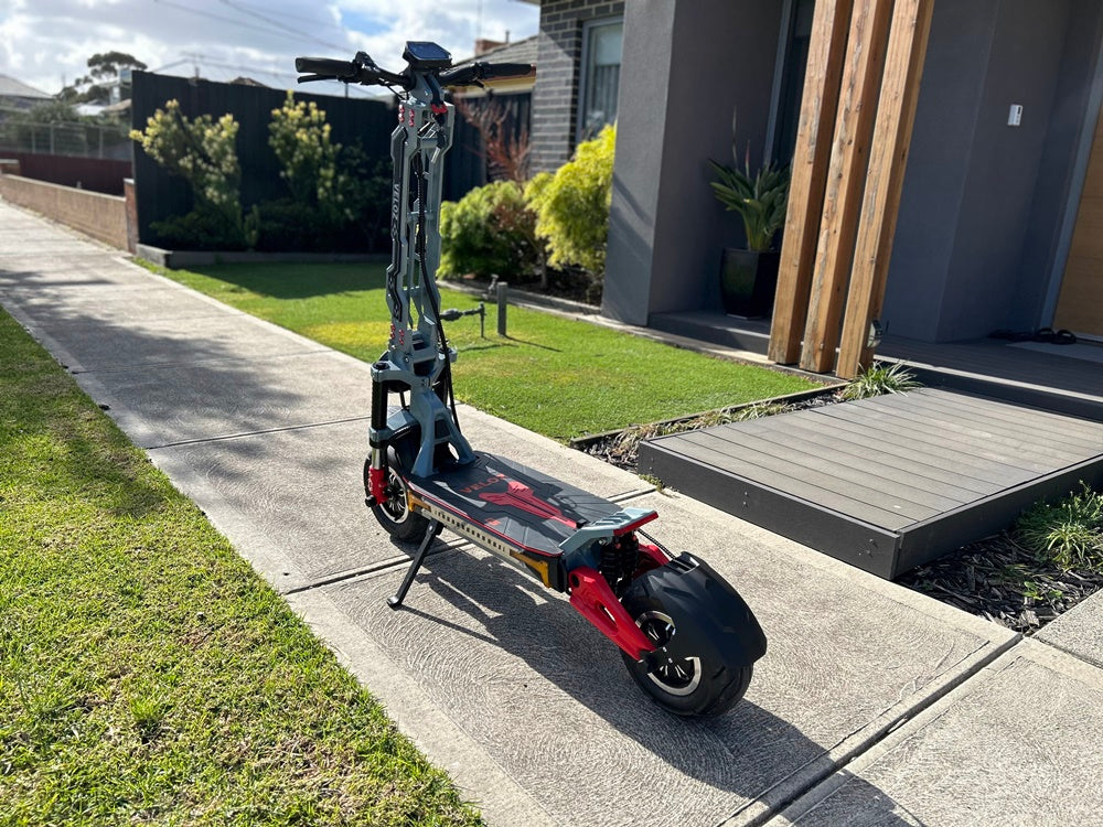 G5 electric scooter parked on a sidewalk