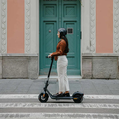 a woman riding f2 segway ninebot